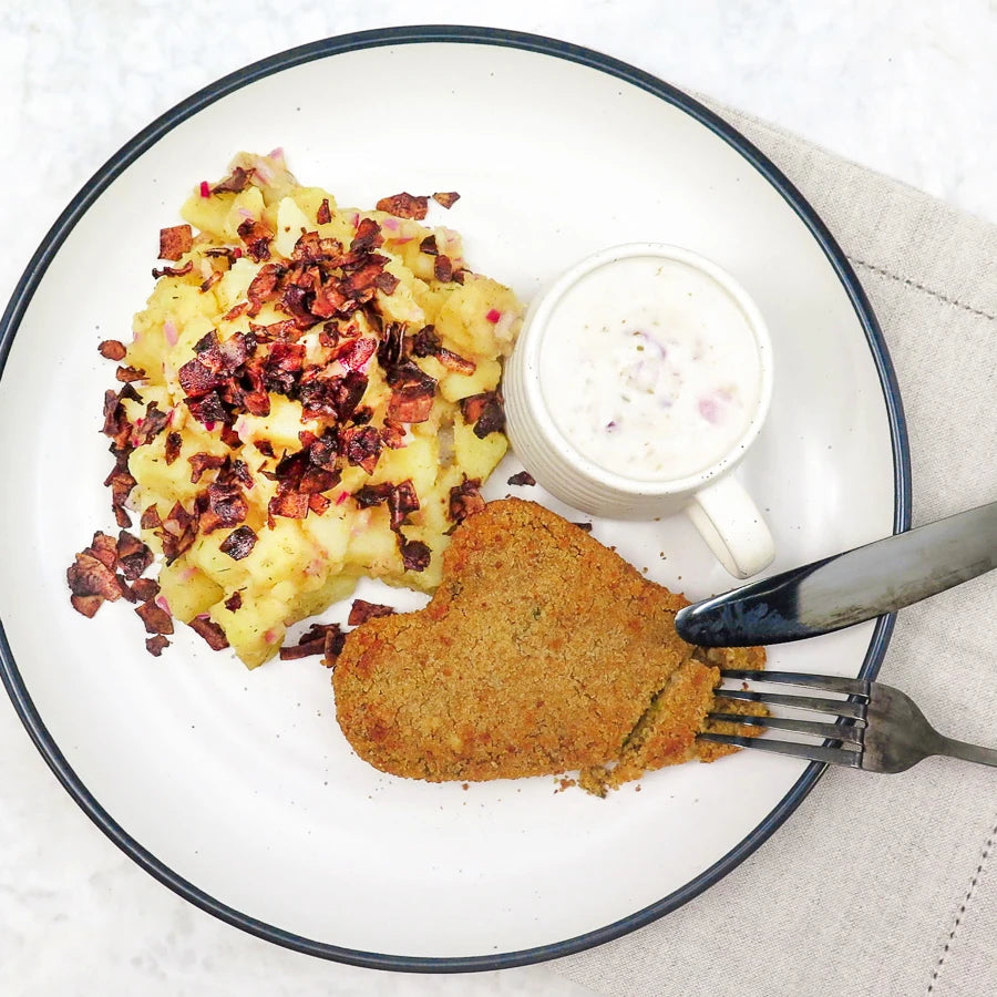 Forever schnitzel with German-style potato salad