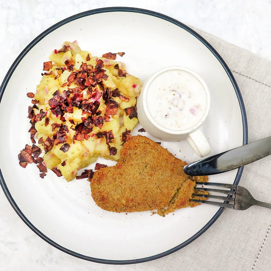 Forever schnitzel with German-style potato salad