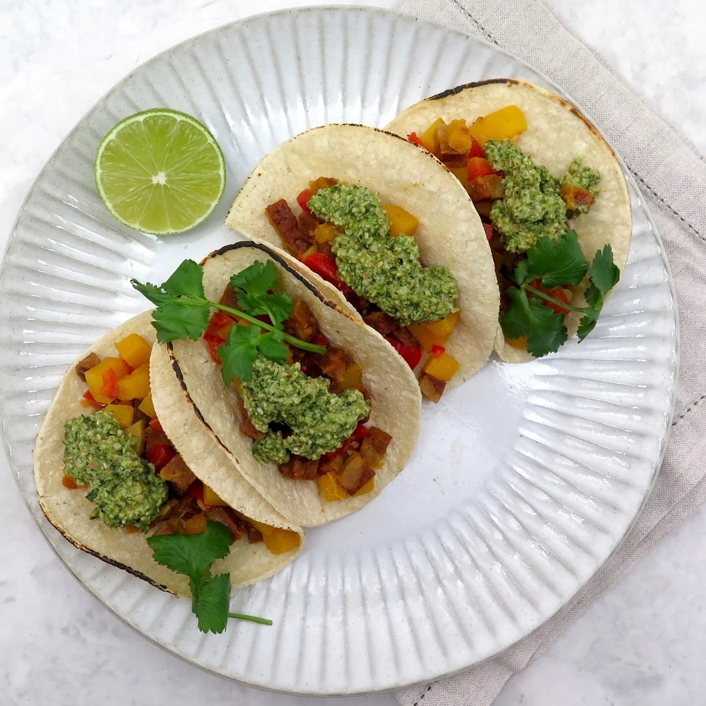 Pumpkin, smoky rasher and capsicum tacos